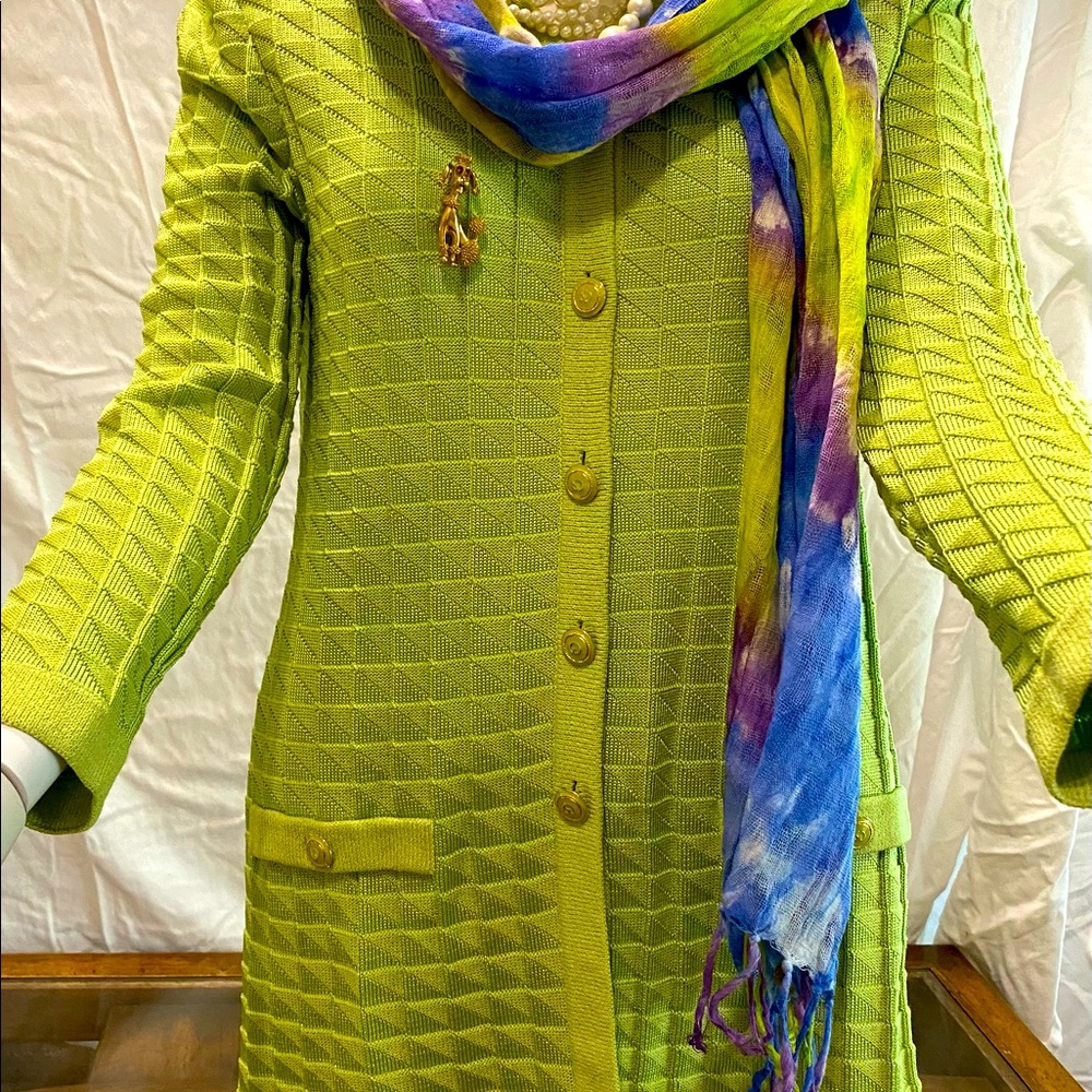 St.John  jacket size p skirt 2.Tiny pull where pin was.Like new condition.